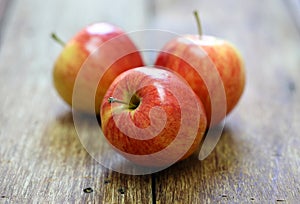 Red apple fruit on wood