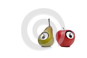 Red apple and green pear isolated on white