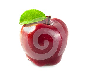 Red apple with leaf.