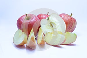 Red apple with leaf and slice