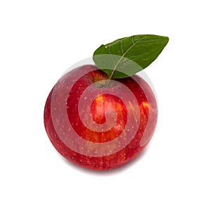 Red apple with a leaf on a white background