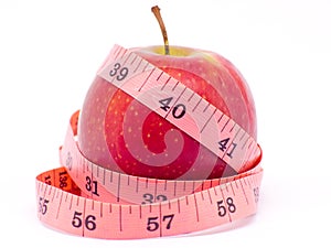 REd Apple with measure tape