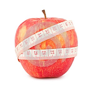 Red apple and measure tape