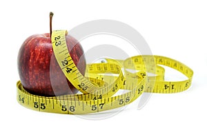 Red apple with measure tape