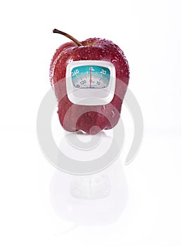 Red apple and measurement meter