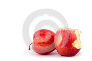 Red apple with missing a bite on white background healthy apple fruit food isolated