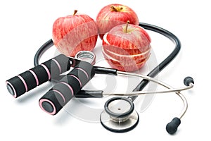 Red apple and sport equipments and stethoscope ,Diet plan health