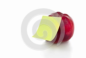 Red apple with stiker note