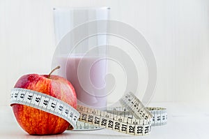 Red Apple with Tape Measure and a Fruit Smoothie