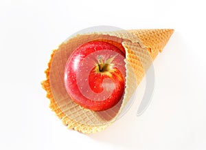 Red apple in waffle cornet