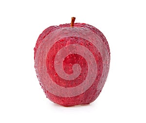 Red apple with water drops isolated on white background