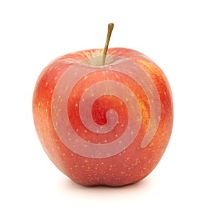 Red apple on a white background with a shadow.