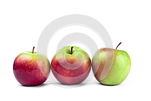Red apple on a white backgroundThree red green apples on a white isolated background