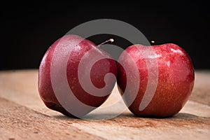 Red apple on wooden