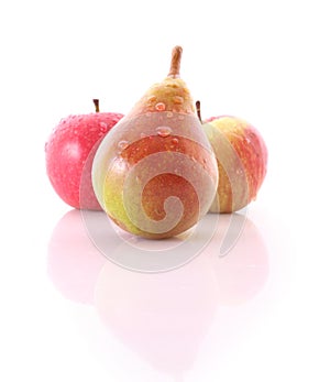 Red apple and yellow-green pear isolated