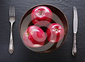 Red apples and table settings.