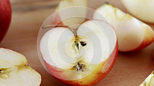 Red apples on wooden board