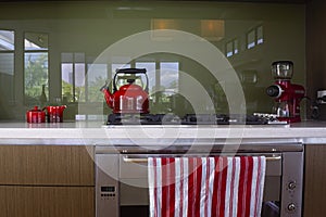 Red appliances on a kitchen bench photo