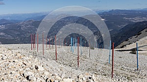 Red and Aqua poles making a pathway on Mont Ventoux