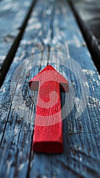 Red arrow pointing upward on a white background with copy space for financial and business concept