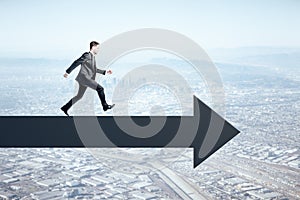 Red arrow with running businessman