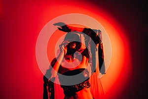 Red art portrait neon light surreal woman trance