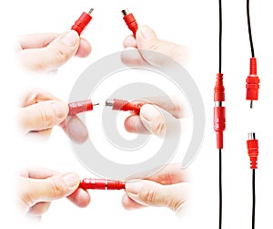 Red audio connectors in hands