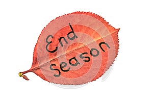 Red autumn leaf with the inscription END SEASON, isolated on awhite background