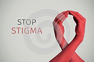 Red awareness ribbon and text stop stigma
