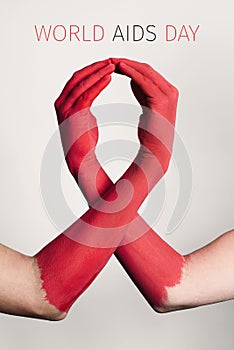 Red awareness ribbon and text world aids day