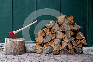 Red Axe and Pile of Fire Wood