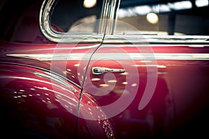 Red back door of a retro car.