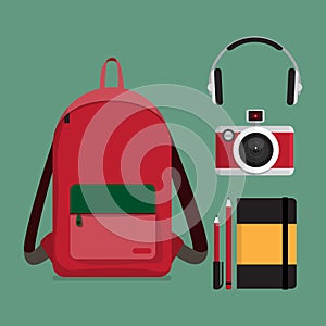 Red backpack with multiple items.
