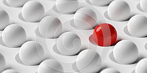 Red ball in array of white balls on white background, concept of standing out, being different, inclusivity or uniqueness concept