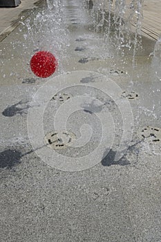 red ball at floor fountain , Stuttagrt, Germany
