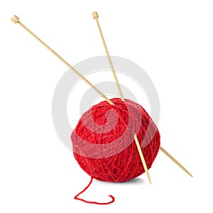 Red ball of wool and knitting needles