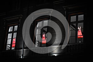 Red ballet Dress behind the window photo