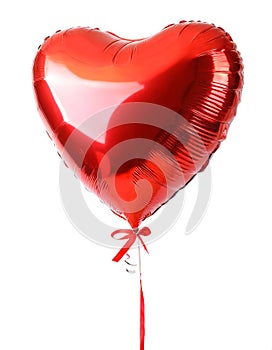 Red balloon in the shape of a heart isolated on a white background.