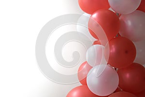 Red balloons on white background used for carnival.