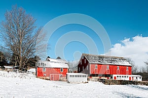 Red barn on a farm in the snow, York County, Pennsylvania