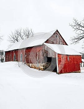 Red barn on a farm in the snow, York County, Pennsylvania