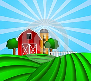 Red Barn with Grain Silo on Green Pasture