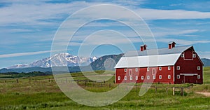 Red barn and mountain landscape