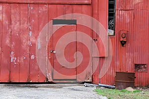 Red barn old abandoned farm building door