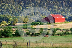 Red barn and pasture land