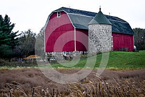 Red Barn with Stone Silo and Cone Top