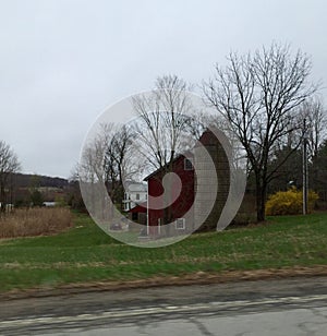 Red Barn And White Farmhouse