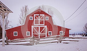 Red barn winter in Canada