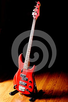 Red bass guitar