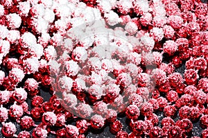 Red beads in snow